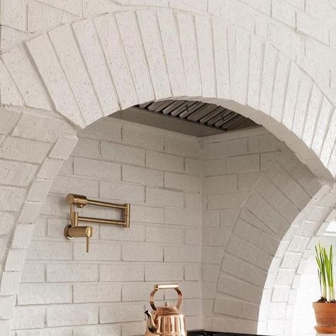 Buildertrend on Instagram: "It’s amazing how much texture and dimension this arched, brick hood adds to an already beautiful kitchen. ⁣ 🏡: @koenigbuilding" Arched Oven Hood, Brick Arch Over Stove, Brick Oven Hood, Arched Stove Alcove, Stucco Kitchen Hood, Arch Range Hood, Brick Oven Kitchen, Brick Archway In Kitchen, Oven Vent