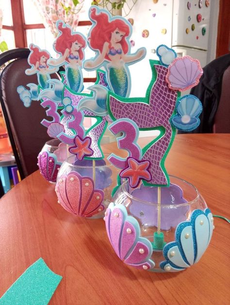 Diy Mermaid Birthday Shirt, Mermaid Party Table Decor, Mermaid Centerpiece Ideas Diy, Ariel Centerpieces Ideas, Baby Ariel Birthday Party, Little Mermaid Balloon Garland, Ariel Birthday Party Decorations, Mermaid Centerpiece Ideas, Ariel Themed Birthday Party