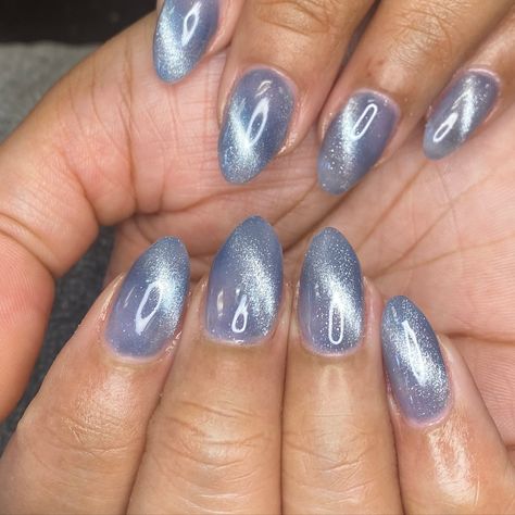 Cat eye adds such a fun flair to you nails! Ask about it at your next appointment! #manicure #nailsnailsnails #nailstagram #nailsonfleek @nikki.brushed.nail.salon Blue Grey Cat Eye Nails, Baby Blue Cat Eye Nails, Light Blue Cat Eye Nails, Blue Cat Eye Nails, Jersey Nails, You Nails, Blue Cat Eye, Eye Nails, Nail Stuff