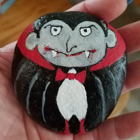 Count Dracula, Painted Stone, Rock Ideas, Painted Rock, Stone Art, Dracula, Stone Painting, Painted Rocks, Halloween