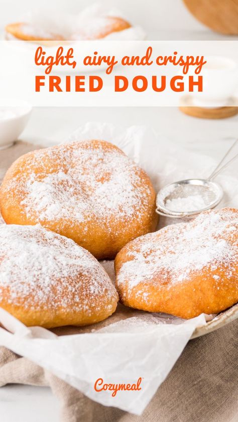 Flattened, disc-shaped fried dough is a classic dessert found in outdoor food stands at country fairs and carnivals. This fried dough recipe produces a fluffy, chewy and crip-edged fried bread with a generous dusting of powdered sugar. Fluffy Fry Bread Recipe, Fried Dough Recipe, Fried Dough Recipes, Donut Recipe Fried, Indian Fried Bread Recipe, Portuguese Dessert Recipes, Fried Bread Recipe, Breakfast Donuts, Fried Bread