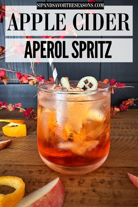 Best Thanksgiving Drinks, Aperol Spritz Thanksgiving, Halloween Aperol Spritz, Apple Cider Aperol Spritz Recipes, Apple Cider Aperol Spritz, Fall Aperol Spritz Recipe, Fall Spritz Cocktail, Aperol Spritz Recipe Mocktail, Fall Aperol Spritz