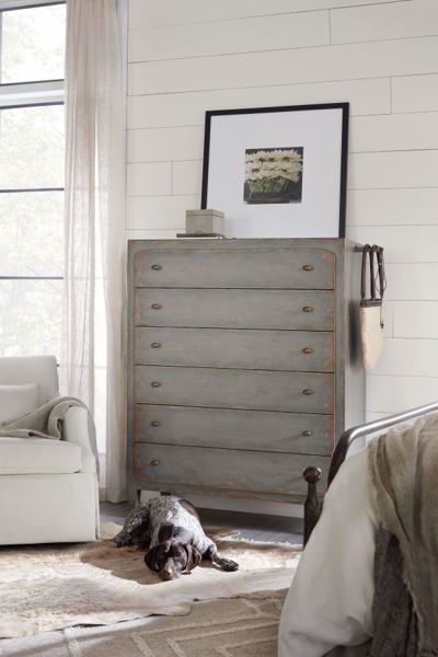 Inspired by European farmhouses, the 6-drawer Ciao Bella Chest reflects a simpler lifestyle. The Time Worn gray finish with multi-layer rub-through makes the chest look like it's been passed down through generations. A pull-out garment rod on either side of the case just above the top drawer provides a convenient space to hang frequently-used items or to lay out your clothes for early-morning departures. There's a drop-in felt liner in the top drawer, and the bottom drawer is cedar lined. Hooker Furniture Bedroom, Chest Drawers, Grey Drawers, European Farmhouse, Six Drawer Dresser, 6 Drawer Chest, Chest Dresser, Ciao Bella, Tall Chest