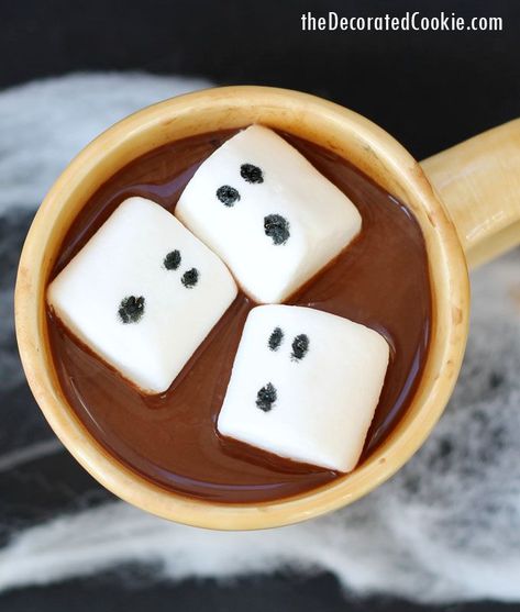 ghost marshmallows for Halloween hot cocoa Ghost Marshmallows, Halloween Hot Cocoa, Halloween Hot Chocolate, Zombie Costume Kids, Halloween Apartment, Marshmallow Halloween, Fun Halloween Party Food, Strawberry Swirl Cheesecake, Apartment Halloween