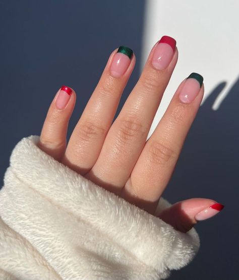 23. Alternating Red and Green French Tips Christmas French Tips Red And Green, French Manicure Red Tips Square, Red And Green Christmas French Tips, Red And Green French Tip Nails Almond, Christmas Nails Red And Green French Tip, Red White And Green French Tip Nails, Christmas French Tips Square, Short French Tip Christmas Nails, Red Green Nails Christmas