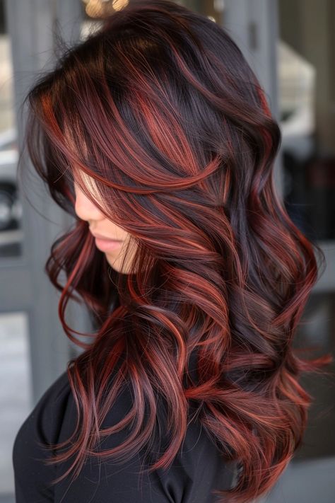 2024 is the year of the redhead! Check out these 35 must-see shades of reddish brown hair that are about to be everywhere. So many gorgeous hues to obsess over, including this stunning look of chocolate brown hair with red highlights. Click to read more and save this pin! Red Brown Hair With Copper Highlights, Cola Red Hair Highlights, Darker Red Hair Color, Chocolate Brown Hair With Copper Highlights, Dark Hair With Cherry Cola Highlights, Carmel Balayage Highlight, From Red To Brown Hair Transition, Red Hair Balayage Brown, Red Biolage Hair