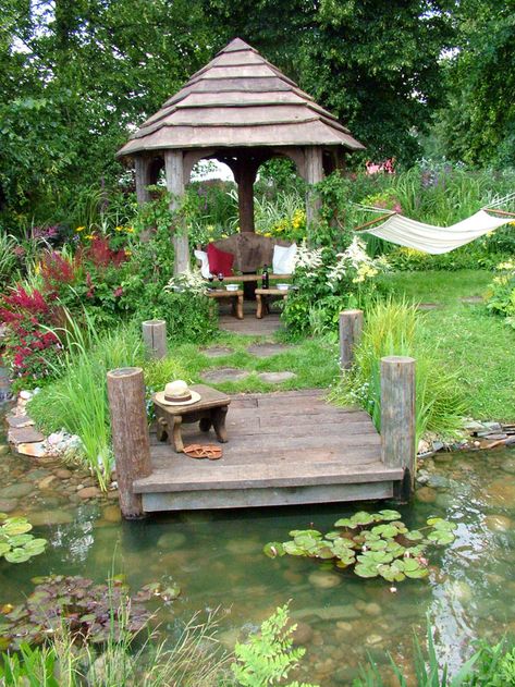 weathered wood gazebo with dock  and pond Wooden Garden Gazebo, Backyard Flowers Garden, Hampton Court Flower Show, Portable Gazebo, Taman Air, Aquatic Garden, Wooden Gazebo, Pond Landscaping, Backyard Flowers