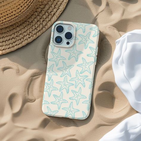 Dive into summer with our Light Beachy Sea Stars Pattern Phone Case. Embrace the serene beach vibes and coastal charm with this super cute and trendy design, adorned with delicate sea stars. Available for a large selection of iPhone models, this high-quality, tough glossy case is the perfect accessory for summer adventures. Treat yourself or someone special to a touch of seaside magic. Add vibrance to your device with our top-tier cases from CaseNookCo. Meticulously crafted for a snug fit and ch Cute Beachy Phone Cases, Cute Iphone 11 Cases, Preppy Summer Aesthetic, Beachy Phone Case, Phone Cases Iphone 12, Phone Cases Iphone 13, Phone Case Inspo, Iphone 11 Phone Cases, Beach Phone Case