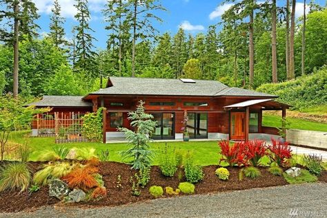 If there is such a thing as "Pacific Northwest" style inherent to the region's houses, it's almost certainly the "Northwest Contemporary." Exactly what that can be, though, is harder to pin down. Pivot Doors Entry, Pacific Northwest Style, Concrete Exterior, Northwest Style, Rolling Barn Door, Usa House, Wood Roof, Bainbridge Island, Cute House