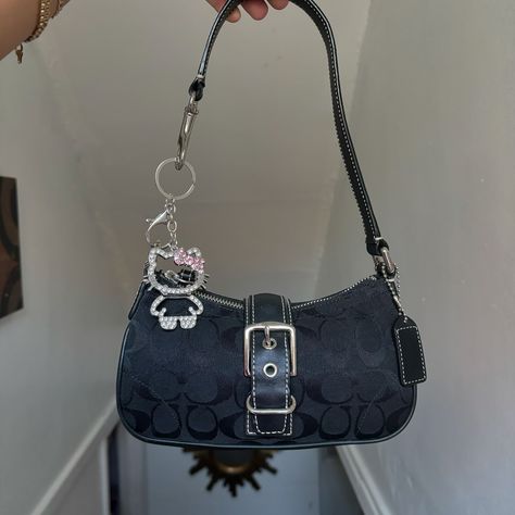 $220 free shipping 💌SOLD Y2K Coach Demi Black Buckle Hampton Shoulder Bag ⁩approx measurements 8.5” L 4.5” H 2” W with 7” drop - excellent condition🍒 charm included - very tiny and lightweight! super cute!! - magnetic buckle closure #coach #vintage #y2k #minimalistic #purse Coach Demi Bag Outfit, Coach Bags With Charms, Coach Bags Black, Coach Bag Charms, Coach Bag Charm, Vintage Coach Bags, Bags Coach, Christmas 2023, Black Shoulder Bag