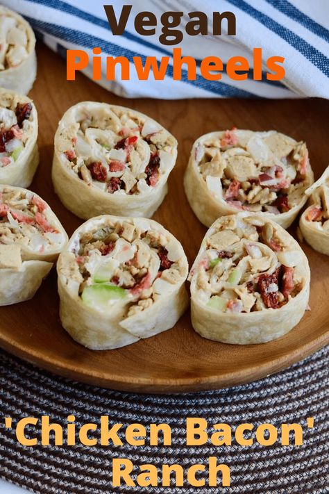 These Vegan Pinwheels are the ultimate party food appetizers! Loaded with a mock ‘chicken bacon’ cheese-y creamy ranch filling, veggies, seeds. These easy tortilla roll-ups will become your new favourite appetizer recipe. Quick & easy to make, easy to transport. Perfect for picnics, parties, game days and holidays! Serve cold. Dairy Free Tortilla Roll Ups, Dairy Free Pinwheel Appetizers, Favourite Appetizer, Vegan Pinwheels, Mini Tea Party, Mock Chicken, Whole Plant Based, Vegan Bacon Bits, Recipes Budget