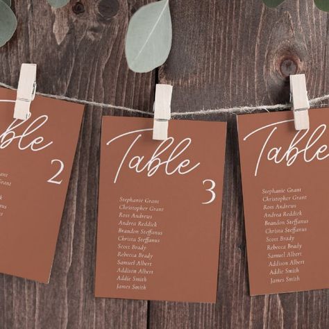 Autumn Wedding Seating Chart, Simple Fall Wedding Reception Decorations, Terracotta Seating Chart, Fall Wedding Seating Chart Ideas, Wedding Invitations Terracotta, Table Chart Wedding, Unique Wedding Seating Chart Ideas, Terracotta Wedding Table, Hanging Seating Chart