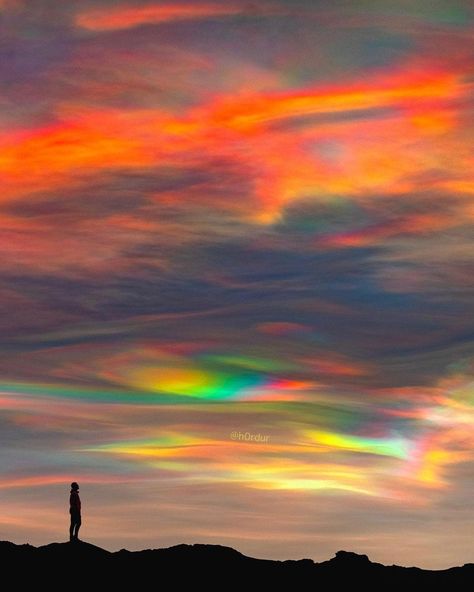 Polar Stratospheric Clouds ☁️🌈✨ ICELAND Experienced some of the most incredible polar stratospheric clouds I’ve ever seen in my life few days ago (also called nacreous clouds). The sun was rising so the orange glow blended with those unbelievable rainbow clouds. Polar stratospheric clouds are rare and only form in the Arctic polar region. Photo Credit.. h0rdur Polar Stratospheric Clouds, Stratospheric Clouds, Nature Aesthetics, Rainbow Clouds, Real Nature, Rainbow Sky, Beautiful Skies, Sky Pictures, Artwork Photography