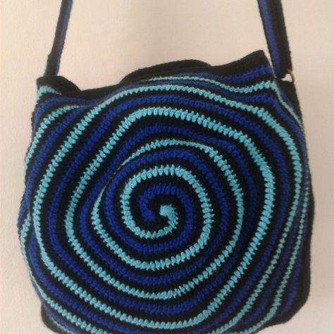 Crocet Bag Idea  Crochet Bag (Spiral)  Aren't  you just tired of regular stripe crochet bags? Add a little twirl  in your life with these trendy spiral designs.  Its is a complete square with height and lenght being approximately 15 inches. Because of the spiral sbape, the bag is  stretchy to accommodate  its contents. -Adjustable straps. -The bag is designed with an internal zipped pocket and main outer zipper. -Interior lined with pongee fabric Striped Crochet Bag, Crochet Spiral Bag, Crochet Spiral Top, Multicolor Crochet Tote Bag With Adjustable Strap, Brown Crochet Bag With Adjustable Strap, Emo Crochet Bag, Crochet Spiral, Stripe Crochet, Spiral Crochet