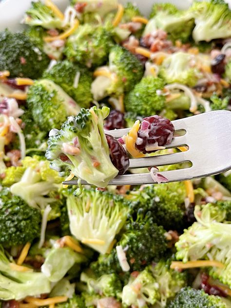 This Broccoli Crunch Salad with Craisins is a classic and delicious side dish. It's full of crunchy texture, sweet flavor, and tanginess that your guests will love. Plus, it's easy to make ahead of time and can be served cold or at room temperature. Try this recipe today Broccoli Romaine Crunch Salad, Christmas Crunch Salad Recipe, Side Dishes Cold Make Ahead, Cold Broccoli Salad Recipes Healthy, Broccoli Craisin Salad, Cold Broccoli Salad Recipes, Brocoli Salad Recipes, Recipe For Broccoli Salad, Craisin Salad