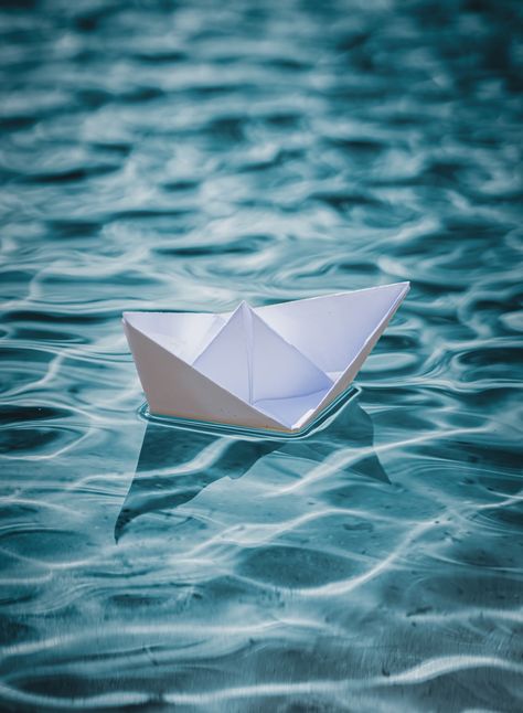 Download this photo by Janis Fasel on Unsplash Origami Boat, Paper Boat, Origami, Floating, Water