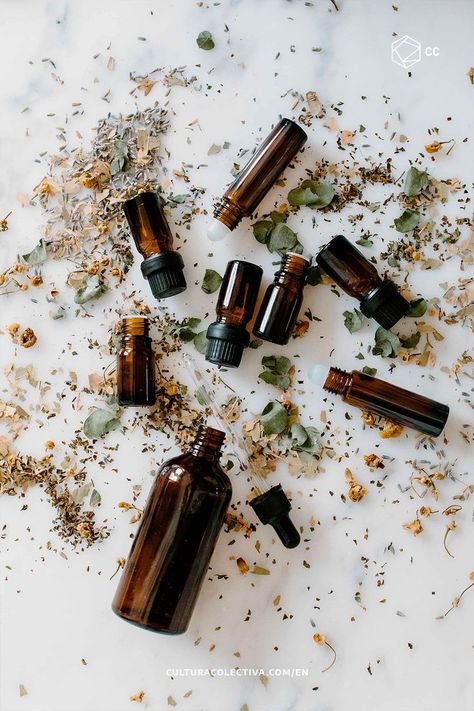 Over a white marbled surface, there are a bunch of dark-glass containers sprinkled with leave and flower dust Thieves Oil, Natural Hair Growth Oil, How To Make Oil, Brown Spots On Face, Natural Hair Oils, Essential Oil Benefits, Fuller Hair, Growth Oil, Beard Care