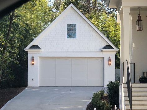 Garage Same Color As House, White House Exterior Garage Door, Cottage Style Garage Doors, Garage Doors White Brick House, Taupe Garage Door White House, White Houses With Black Garage Doors, Garage Updates Exterior, Detached Garage Renovation, White House With Garage Door