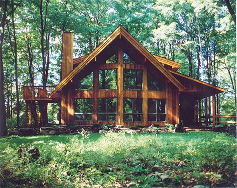 The Woodland house plan is a cottage with a prow roof. Over 1400 square feet with a covered porch and 2 bedrooms. Call Linwood Homes to learn more: 1-888-546-9663 A House In The Woods, Linwood Homes, Chalet House, Woodland House, Log Cabin Ideas, Log Cabin Homes, A Frame House, Cabin In The Woods, A Log