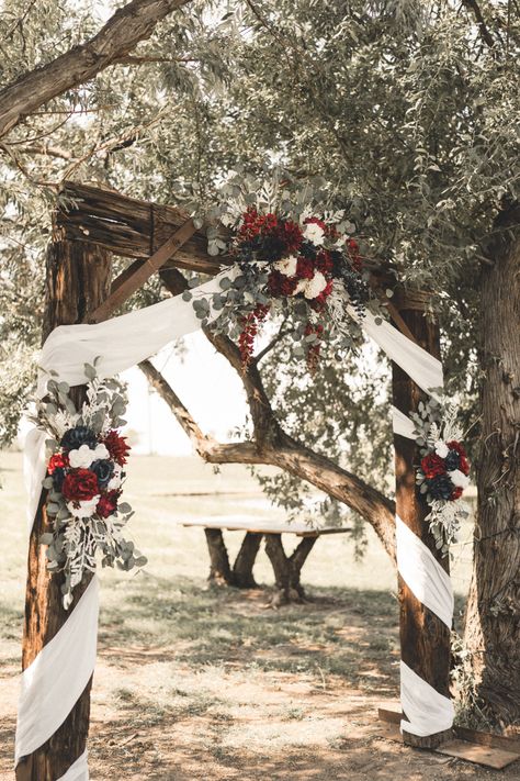 Rustic Red And Blue Wedding, Red White And Blue Wedding Arch, Wedding Arch Ideas Burgundy And Navy, Burgundy And Navy Wedding Rustic, Navy Blue And Burgundy Rustic Wedding Decor, Burgundy Navy Blue And White Wedding, Burgundy Red And Navy Blue Wedding, Navy And Burgundy Wedding Decorations Wedding Ceremony Decor, Navy Blue And Cabernet Wedding