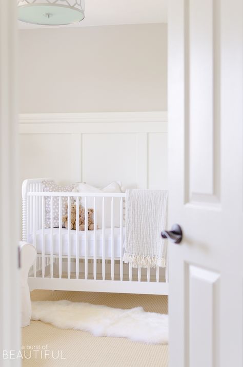 Pale Oak And Simply White, Pale Oak Nursery, Neutral Nursery Panelling, Chair Rail Nursery, Neutral Nursery Paint Colors, Pale Oak Benjamin Moore, Nursery Paint Colors, Simple Floor Lamp, Nursery Wall Painting