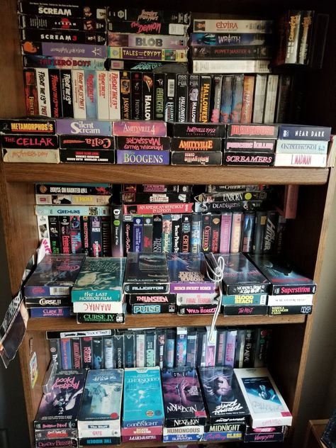 VHS horror movies. A portion of my personal collection. Vhs Collection Display, Vhs Display, Horror Movie Collection, Vhs Collection, Horror Vhs, Movie Theater Rooms, Store Aesthetic, Physical Media, Film Collection