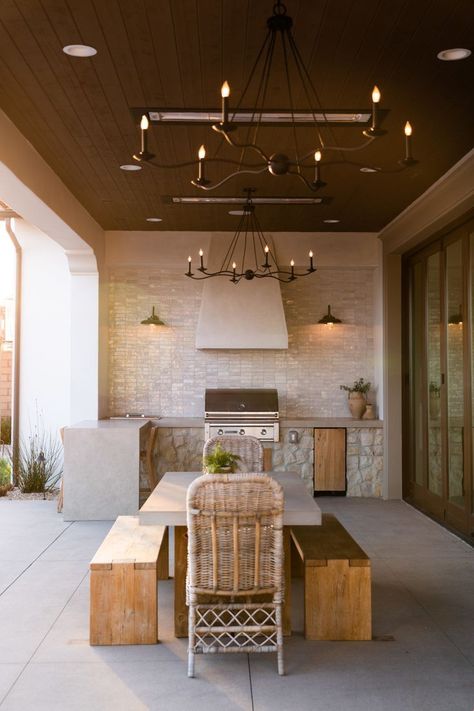 Bar stools around a counter for casual dining.
Outdoor dining table with chairs for larger gatherings.
Shade and Lighting:

Pergola or awning to provide shade and shelter.
String lights or lanterns for ambiance and visibility after dark.

#Tags:
#OutdoorKitchen
#BackyardLiving
#Grilling
#OutdoorCooking
#AlFrescoDining
#HomeImprovement
#KitchenDesign
#OutdoorEntertaining
#DIYProjects Pool House Grill Area, Back Porch And Patio Ideas, California Outdoor Kitchen, Outdoor Dining And Kitchen, Outdoor Kitchen Off House, Outdoor Patio Ideas Kitchen, Outdoor Kitchen Inspiration, Outdoor Kitchen On Patio, Arizona Outdoor Kitchen