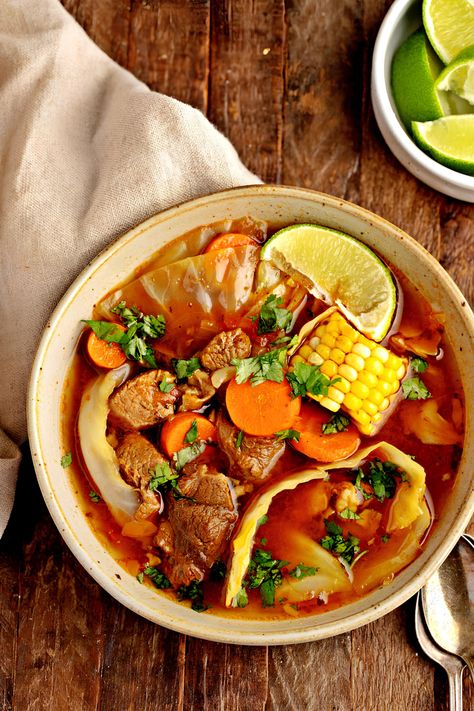 Try caldo de res to warm up from the inside out! This Mexican beef soup is full of beef, veggies, tomatoes, and tasty garnishes. You'll love it! Mexican Beef Soup, Mexican Stew, Mexican Beef, Beef Shank, Copy Cats, Mexican Soup, Lime Rice, Corn Cakes, Cilantro Lime Rice