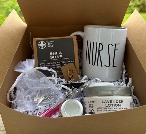 Nurse Care Package Gift Box, Nurse Spa Thank You Gift Basket, Nurses Week Gift, Nurse Appreciation, Nurse Coffee Gift, Nurse Graduation This gift set will be sure to make any healthcare provider feel special. Included in the gift box is a mug, a syringe pen, stethoscope pin, silver badge clip, an angel keychain, mini permanent marker, special nurse themed lotion and  shea soap. Pin and pen color will vary. Mug is 11oz, dishwasher and microwave safe.  "Nurse Thy Self" lotion and shea soap is spec Nurse Care Package, Cardiologist Gift, Doctor Graduation Gift, Doctor Graduation, Lavender Lotion, Personalized Coffee Cup, Nurses Week Gifts, Nurse Mugs, Nurse Graduation