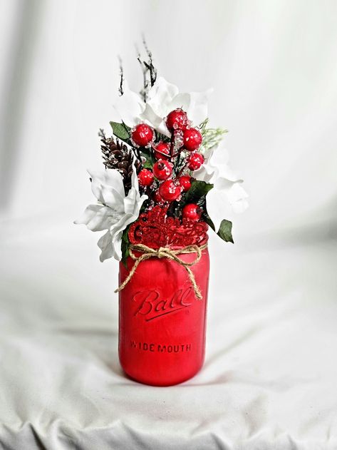 Excited to share the latest addition to my #etsy shop: Christmas Centerpiece w/Pointsettias in Red Mason Jar https://etsy.me/3V3kcRB #christmas #recycledglass #christmasbouquet #xmascenterpiece #christmasjar #rusticchristmas #pointsettiabouquet #uniquemasonjar #christm Canning Jar Gifts, Silver Mason Jars, Red Mason Jars, Scandinavian Candles, Xmas Centerpieces, Colored Mason Jars, Painting Candle Holders, Christmas Bouquet, Christmas Berries