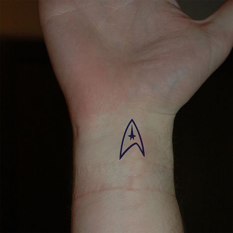 I want this just above my left breast.  tattoo-star-trek-insignia by Andrew J Ferguson, via Flickr Star Trek Tattoo, Star Trek Insignia, Star Trek Logo, Tattoo Star, Movie Tattoo, Movie Tattoos, Geek Tattoo, Tattoos Skull, Ship Tattoo