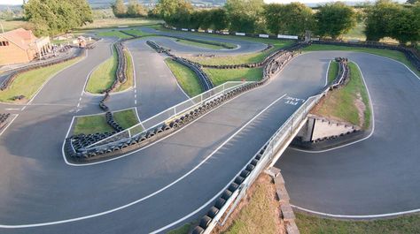 Outdoor go kart racing track in a beautiful sunny day at Herefordshire Raceway in Weobley Backyard Race Track, Go Kart Track Backyard, Outdoor Race Track For Kids, Backyard Go Kart Track, Go Kart Design Ideas, Outdoor Toy Car Race Track, Karting Racing, Go Kart Track, Go Kart Track Design