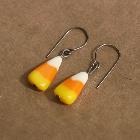 Please check my shop policies and FAQ before placing an order. Thank you :) One pair of realistic candy corn earrings, perfect for Halloween! Available with antique bronze, silver-toned or hypoallergenic surgical steel hooks/studs. Silicone stoppers included. Each candy piece is handmade of polymer clay and measures a little under 2cm (0.75'') for dangle earrings and 1.5cm (0.6'') for stud earrings. NON-EDIBLE! Hook shape may vary slightly depending on stock availability. Pendants and charms ava Candy Corn Jewelry, Fimo Halloween, Corn Earrings, Crazy Earrings, Clay Halloween, Candy Corn Earrings, Fake Candy, Polymer Clay Halloween, Halloween Clay