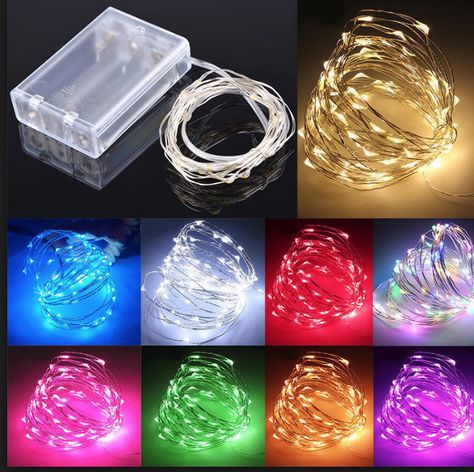 Add a splash of glowing color to any outfit or costume real fast or use these to illuminate your own DIY masterpiece. The clear plastic case tightly holds 3 AA batteries and an On/Off switch. - 100 micro LEDs Color Choice - 33' Silver wire string - 3 AA b Copper Wire Fairy Lights, Starry String Lights, Holiday String Lights, Copper Wire Lights, Battery String Lights, Christmas Tree Garland, Copper Lighting, Wire Lights, Fairy String Lights