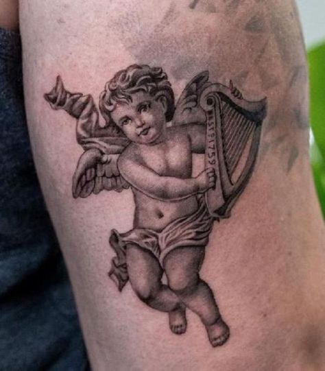 Cherub With Harp tattoo Tattoo Ideas For Men Angel, Angel Playing Harp Tattoo, Flying Cherub Tattoo, Angel With Harp Tattoo, Harp Tattoo, Trumpet Tattoo, Ireland Tattoo, Cherub Art, Cherub Tattoo