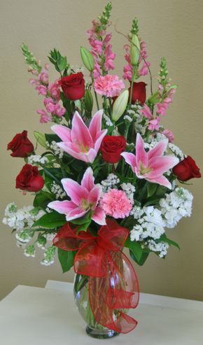 A romantic red, white and pink flower arrangement by your local Riverside florist - Willow Branch Florist of Riverside Y’all Vase Arrangements, Valentine Flower Arrangements, Pink Flower Arrangements, Easter Flower, Altar Flowers, Large Flower Arrangements, Flower Arrangement Designs, Church Flower Arrangements, Creative Flower Arrangements