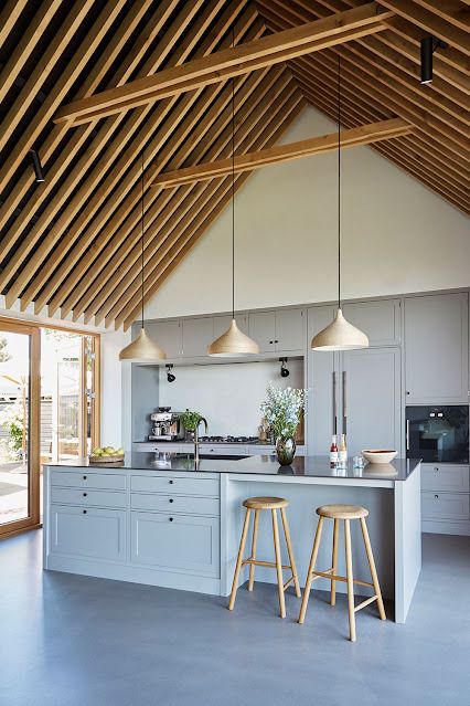 Barn House Kitchen, Mountain House Interior, Kitchen With High Ceilings, Vaulted Ceiling Kitchen, Scandi Kitchen, Barn Kitchen, Modern Barn House, Wooden Bar Stools, Wooden Ceilings