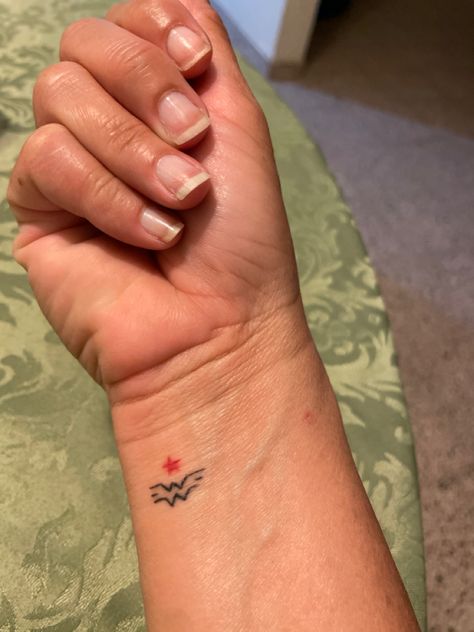 Small Superman Tattoo, Superwoman Tattoo Ideas, Small Wonder Woman Tattoo, Superwoman Tattoo, Wonder Woman Tattoo, Superman Tattoos, Tattoos For Women Small Meaningful, Awareness Tattoo, Mark Tattoo