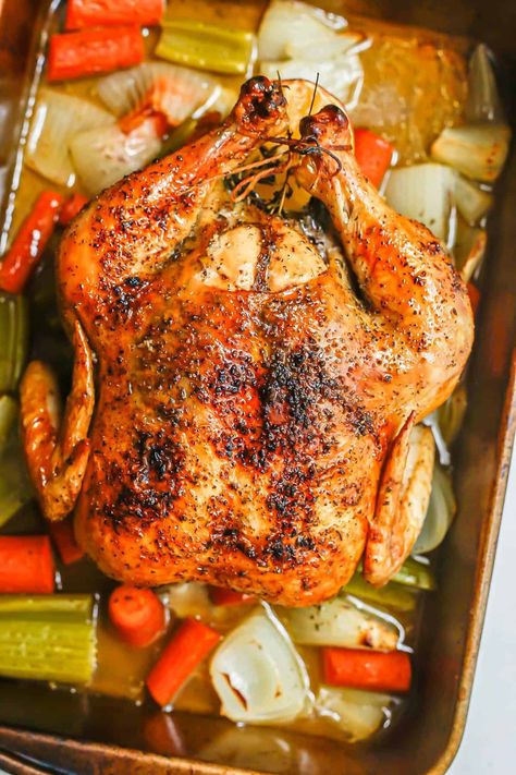 This easy whole roasted chicken is seasoned with lemon and herbs and cooked with onions, carrots and celery for a beautifully browned, crispy and classic oven roast chicken. Whole Chicken In Oven, Whole Chicken Recipes Oven, Chicken With Roasted Vegetables, Roasted Recipes, Oven Roasted Whole Chicken, Roasted Whole Chicken, Roast A Chicken, Classic Roast, Easy Roast