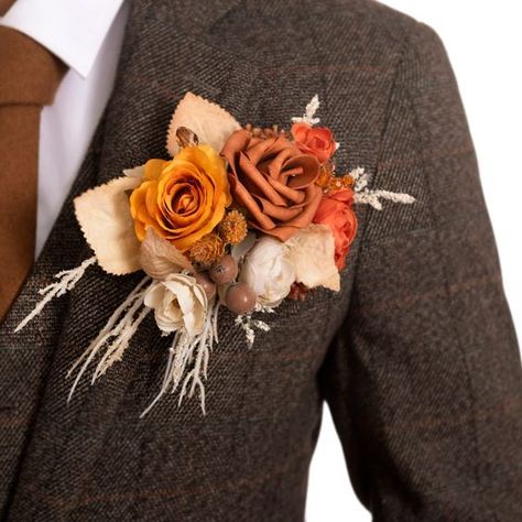 PRICES MAY VARY. Size: The pocket square boutonniere is approx. 6" W x 5" H. Combination of flower and card, the groom can easily put the boutonniere into suit jacket pockets. Material: The boutonnieres are made of amber rose, orange rose, brown berries, pearl floral pick, and beige pampas grass. Great Design: A luxurious boutonnieres designed for the groom. The unique design is convenient for the groom to wear and also allows him Pre-made & Convenient: The boutonniere for men will never wilt an Terracotta Boutonniere, Burnt Orange Boutonniere, Pocket Square Boutonniere, Square Boutonniere, Anniversary Dinner Party, Boutonniere Boho, Orange Boutonniere, Green Boutonniere, Pocket Boutonniere