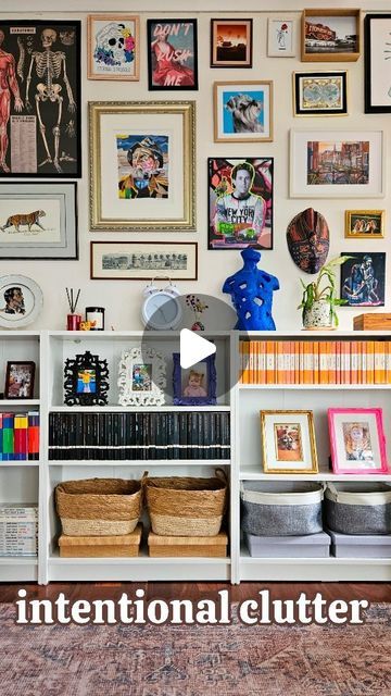 Paula Truscott + Martin Loorits on Instagram: "this audio = spot on 👍 #cluttercore 

some parts of our home may seem visually cluttered but it's all intentional 🥰

✨️ our gallery walls allow us to display all the art we love; we swap things out as we wish and don't feel restricted 

✨️ our shelves allow us to display all the trinkets we love; we always have space for new little things that we've picked up on our travels 

we do try to keep other surfaces a little more simple, so having so much freedom with our gallery walls and shelves is really what helps showcase our personalities 💖

credit to @ethangaskill for these words of wisdom 👏 

~

#gallerywalls
#bookshelfwealth 
#shelfie 
#maximalism" Intentional Clutter, Shelves Styling, Picture Shelves, Statement Wall, Gallery Walls, Maximalism, Shelf Styling, Office Inspiration, Dream Decor