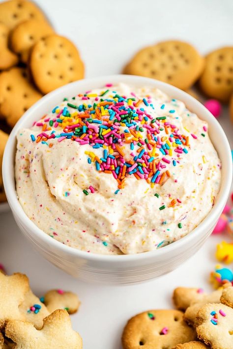 This homemade Dunkaroo dip is a sweet, nostalgic treat loaded with funfetti cake mix, Cool Whip, and creamy vanilla yogurt. It's perfect for parties. Vanilla Wafer Dip, Cool Whip Fluff, Whipped Cream Dip, Funfetti Cake Batter Dip, Cake Mix Dip, Oreo Dip, Confetti Dip, Prom Committee, Dunkaroo Dip