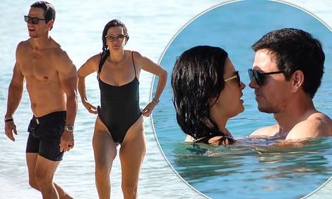 Mark Wahlberg, 51, packs on the PDA with wife Rhea Durham, 44, for a swim in Barbados | Daily Mail Online Rhea Wahlberg, Rhea Durham, Muscular Physique, Long Brunette, Mark Wahlberg, In The Ocean, Beach Look, Guys Be Like, Black Swimsuit