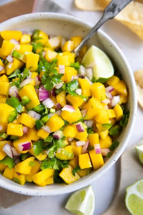 5-Ingredient Mango Salsa Recipe Easy Mango Salsa Recipe, Mango Pineapple Salsa, Papaya Recipes, Mango Salsa Recipe, Pineapple Salsa Recipe, Fresh Mango Salsa, Mango Salsa Recipes, Salsa Recipes, Spicy Salsa