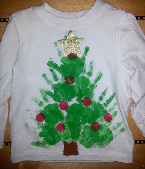 Christmas handprint shirts Handprint tree Toddler Time Tips https://www.facebook.com/toddlertimetips Hand Print Tree, Diy Christmas Shirts, Spirit Days, Diy Ugly Christmas Sweater, Handprint Christmas, Christmas Shirts For Kids, Christmas Clothes, Footprint Art, Christmas Tree Shirt