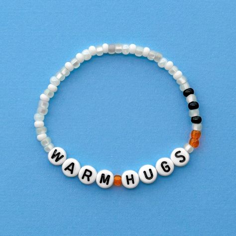 Warm Hugs bracelet! Handmade with love using Czech glass beads, white and black letter beads and stretch cord. Get creative! All my bracelets are meant to be mixed, matched & stacked!  SIZING: Measure your wrist around the widest point and add .25-.5 inches to get the most comfortable or desired fit. If you don't have a flexible tape measure, you can use a piece of string to wrap around your wrist and then measure the length of the string. (For example: my wrist size is 6" and I will wear a 6.5" bracelet for a snug fit and 7" for a loose fit). CARE INSTRUCTIONS: Please be careful to not overstretch bracelets too far. They are made out of a durable elastic string but are still capable of breaking if not handled carefully. Avoid submerging bracelets in water and store in a dry place. I'd lov Disney Friendship Bracelet Ideas, Disney Bracelet Ideas, Disney Friendship Bracelet, Disney Friendship, Disney Bracelets, Disney Bands, Cute Friendship Bracelets, Homemade Bracelets, Disney Bracelet