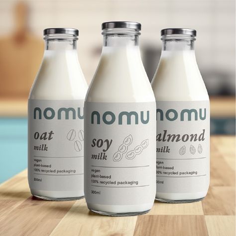 Introducing Nomu - an alternative, vegan milk brand offering Almond, Soy and Oat milks. I had fun creating this passion project - thank you to @briefclub for the brief! . . . . . . . . #briefclub #passionproject #veganmilk #brandidentitydesign #graphicdesigner #packagingdesign #graphicdesignisfun #blackbritishgraphicdesigner #adobeillustrator #adobephotoshop #femalegraphicdesigner #adobecreativecloud Chocolate Package, Milk Design, Milk Brands, Graphic Desi, Vegan Milk, Milk Alternatives, Chocolate Packaging, Adobe Creative Cloud, Passion Project