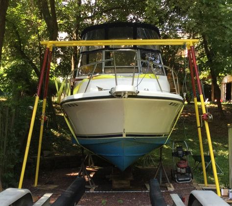 GoHoist is a quick way to lift powerboats, pontoons and sailboats off trailers, cradles and ground. Lift boat off trailer. Boat Lift Ideas, Boat Lift Dock, Boat Hoist, Garden Bench Plans, Boat Restoration, Diy Boat, Boat Lift, Bench Plans, Pontoon Boat