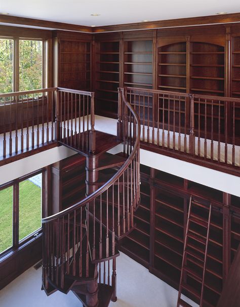 For book lovers, here is upper view of a chestnut colored custom-built library that can make your book collection even more sophisticated with the overall display . #customhomes #library #librarydesign #wood Tall Library, Home Library Large, Townhouse Library, Custom Library, Big House Library, 2 Story Home Library, Two Floor Library, 2 Story Office Library, 2 Story Library