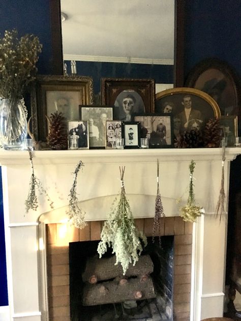 A Southern Gothic Halloween Party | Quaint in Quincy Colonial House Halloween Decor, Haunted House Mantle, Authentic Halloween Decor, Academia Halloween Decor, Witchy Mantel Decor, Goth Mantle Decor, Halloween Decorations Indoor Aesthetic, Elegant Halloween Decor Living Room, Gothic Cottage Decor